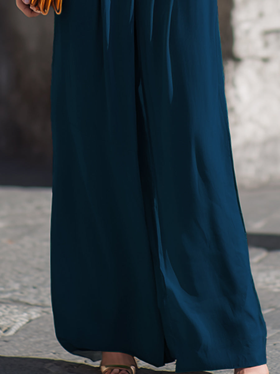 Halter-Neck Pleated Front-Knot Flowy Jumpsuit