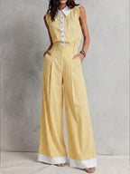 Stylish Casual Two-piece Set: Sleeveless Cotton Top With White Stripe Paneling And Matching Trousers