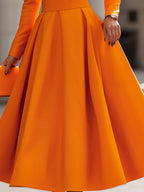 Radiant Elegance: Sophisticated Long-Sleeve Dress With Flair